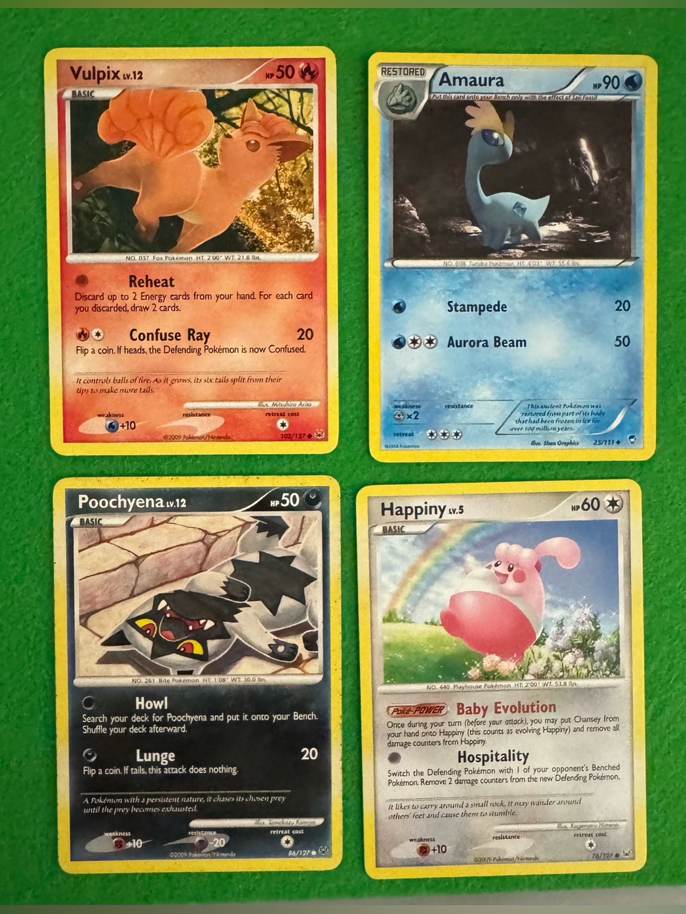 Pokémon Card Lot of 4 – Vulpix Amaura Poochyena Happiny